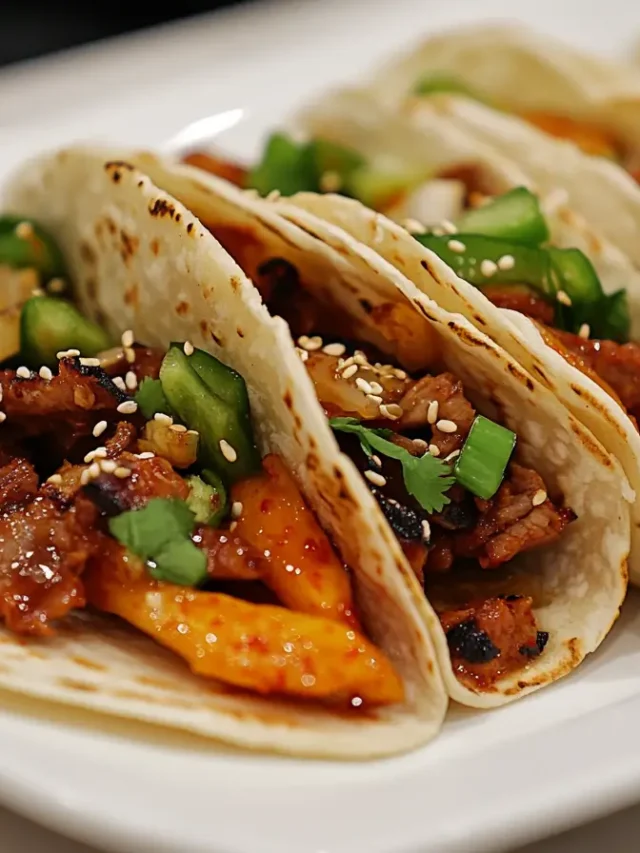 Korean BBQ Tacos served on a white plate