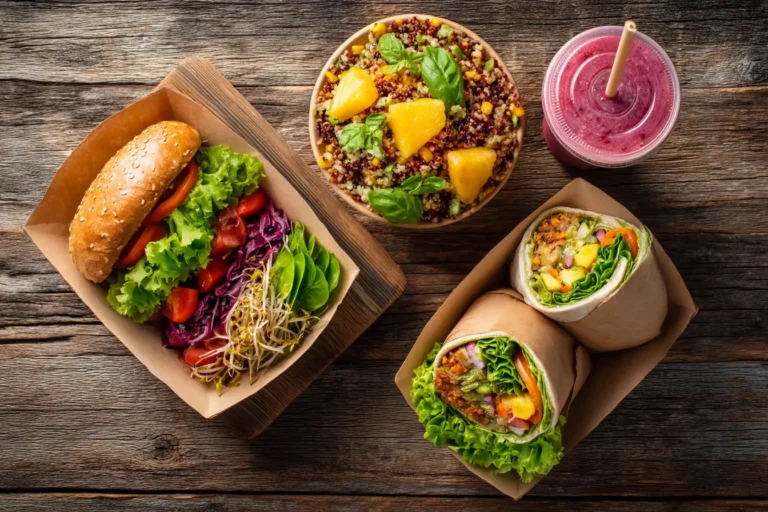 healthy fast food meal ideas with quinoa bowl, veggie wrap, smoothie, and sandwich